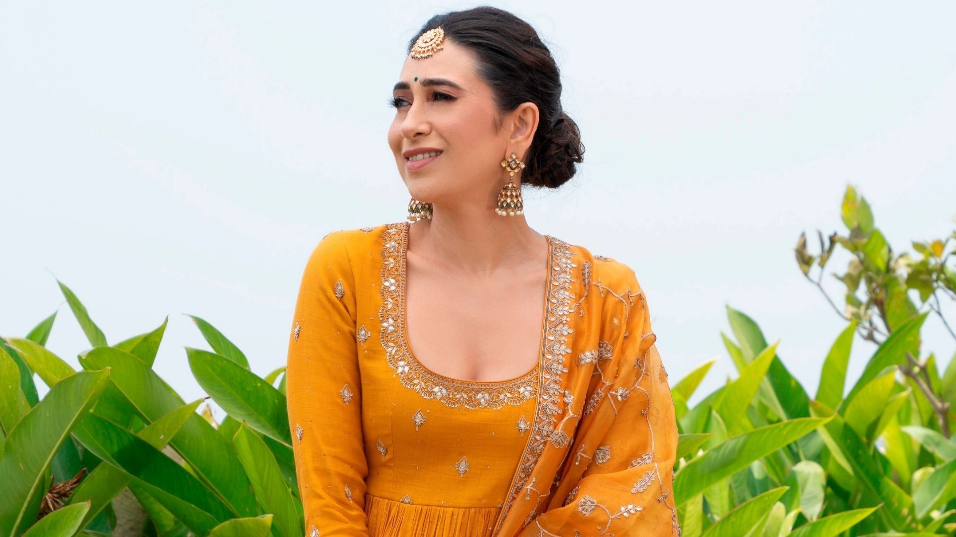 Alia and Ranbir's mehendi Karisma Kapoor spotted in a Punit Balana anarkali set