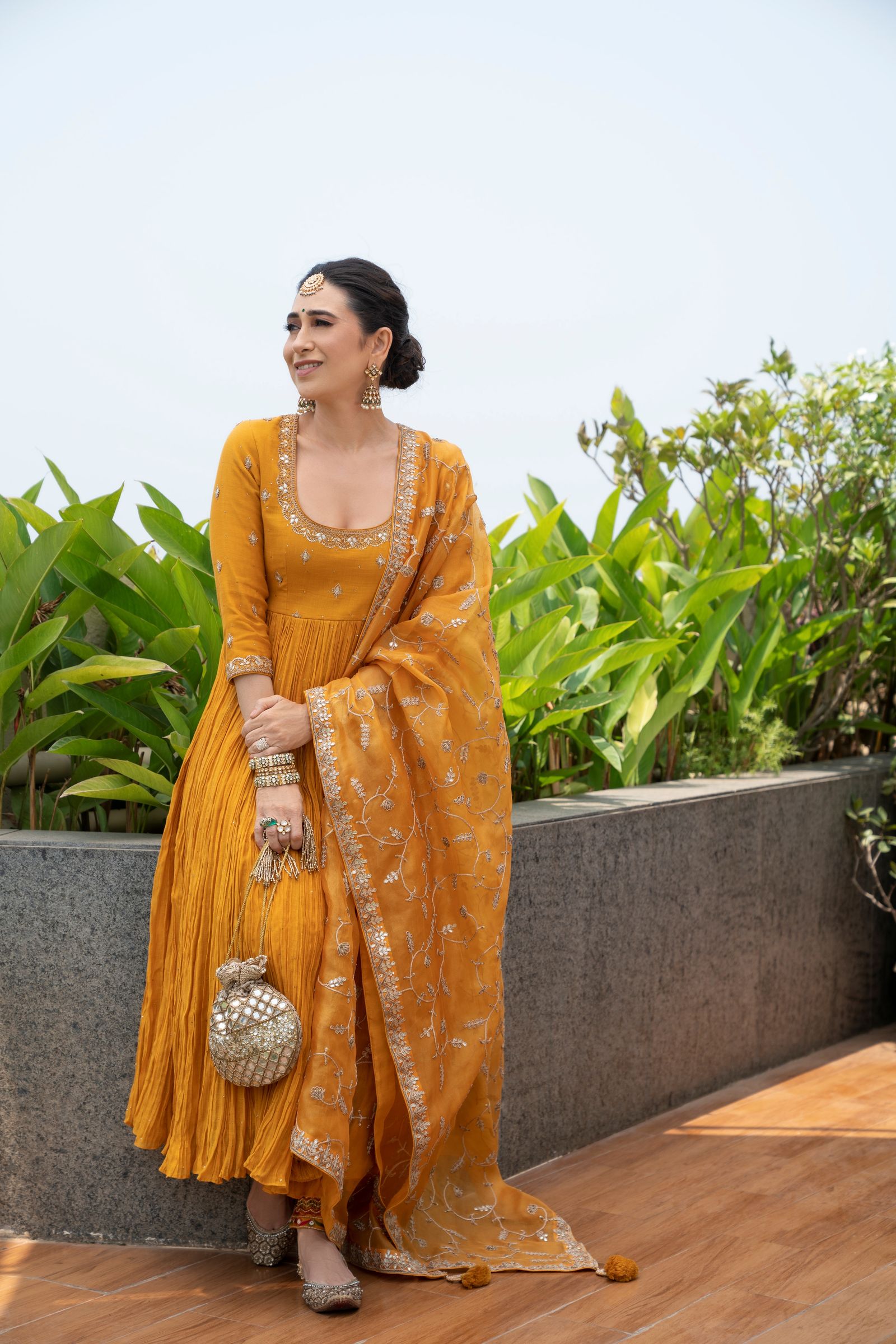 Alia and Ranbir's mehendi Karisma Kapoor spotted in a Punit Balana anarkali set